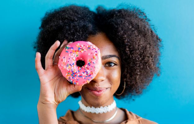 summer intern eating hurts donuts in wichita, kansas