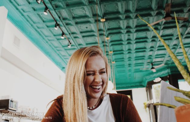 girl poses for a photo at leslie coffee co in delano, wichita kansas