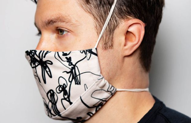 man modeling bella bonita designs face mask in wichita kansas