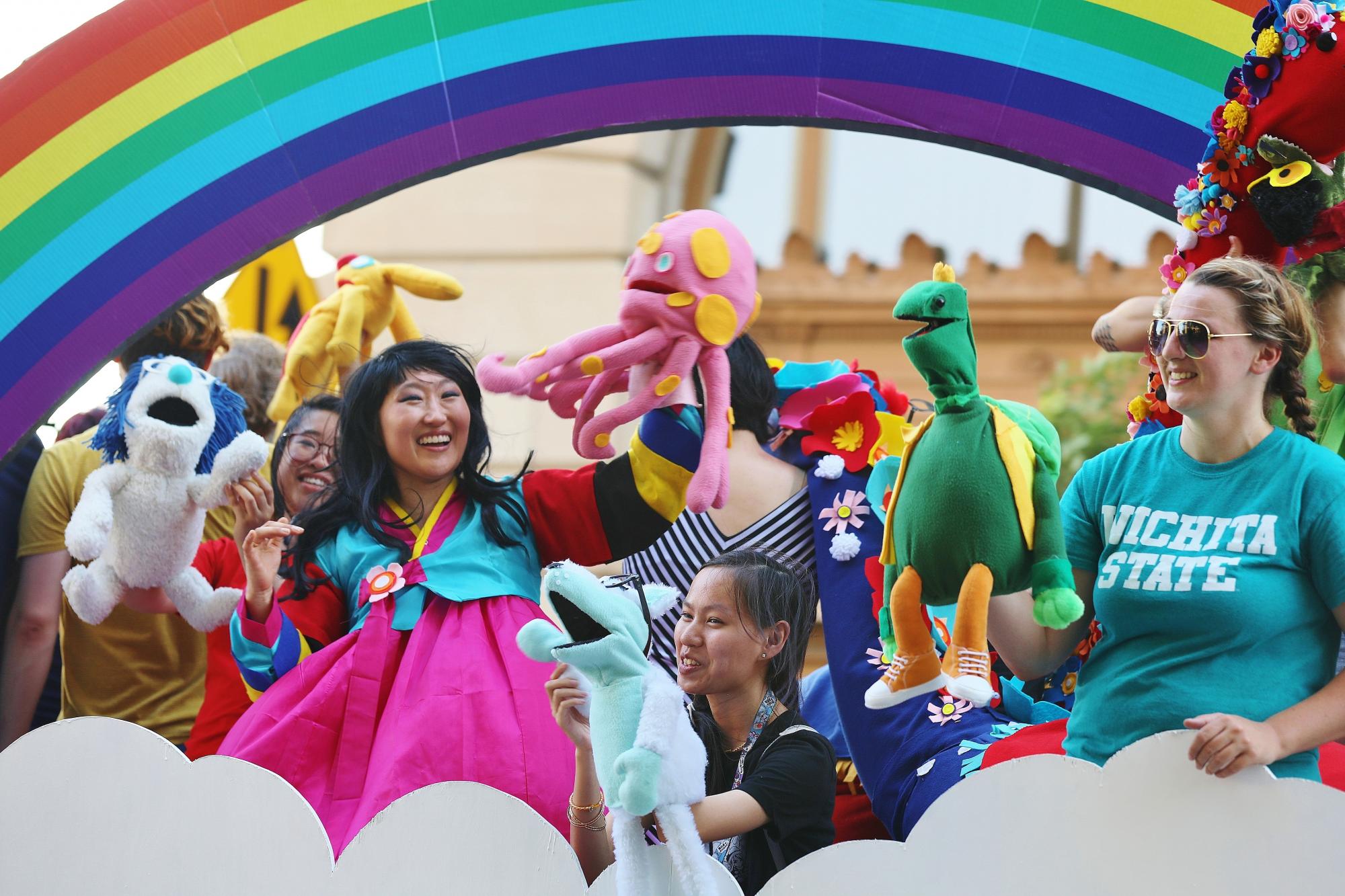riverfest 2018 artist in residence jooyoung choi poses during the sundown parade
